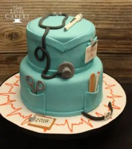 Blue nurse-themed cake