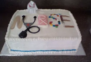 A nurse themed sheet cake with white icing